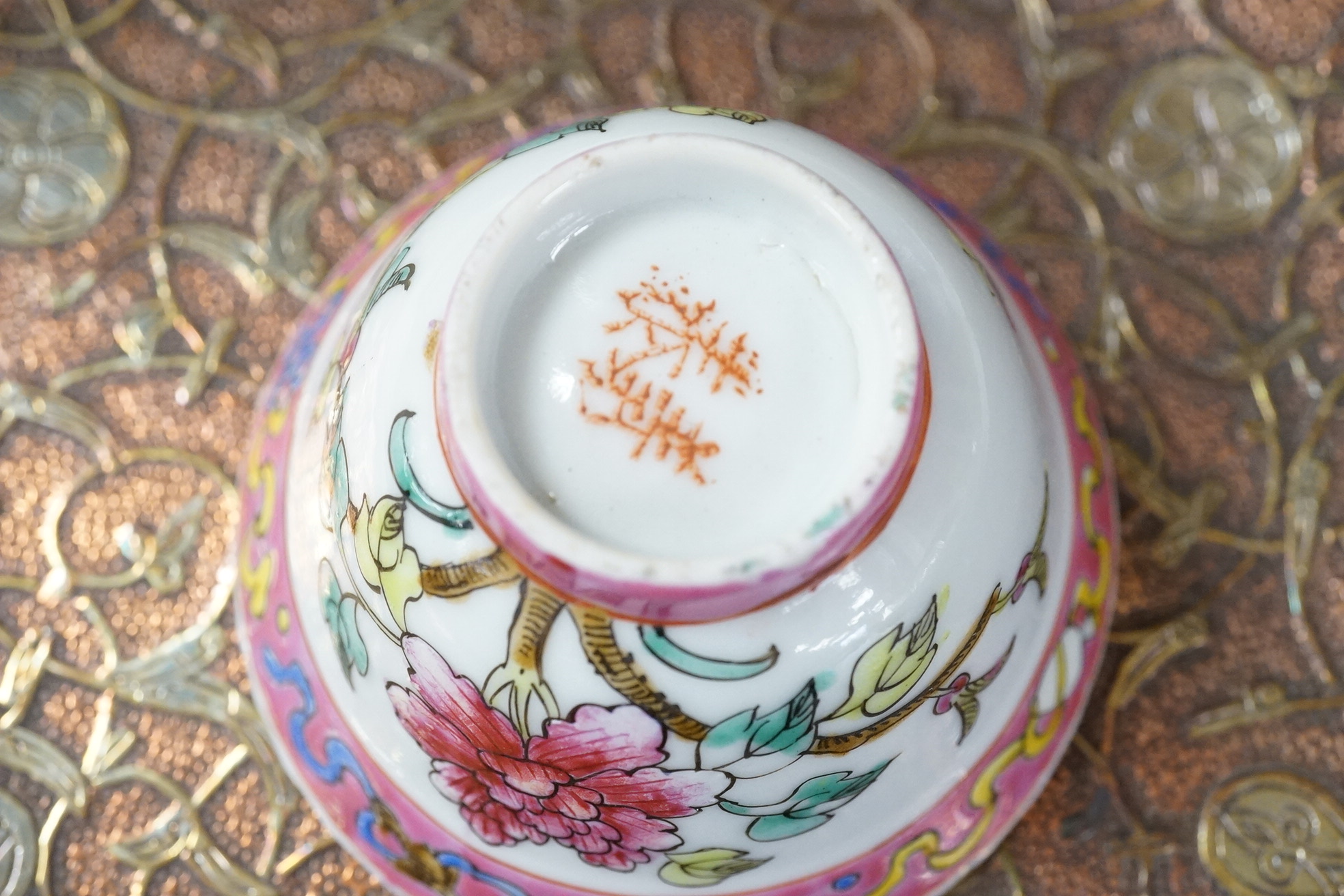 A group of mixed oriental porcelain and metalware to include a Japanese satsuma vase, cinnabar lacquer vase and blue and white teapot, largest 32cm high.